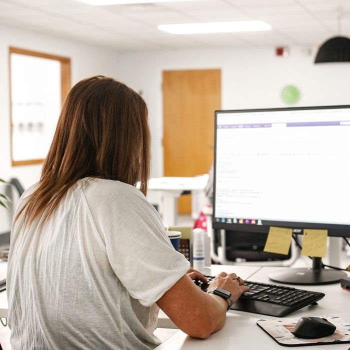 A woman working on a computer