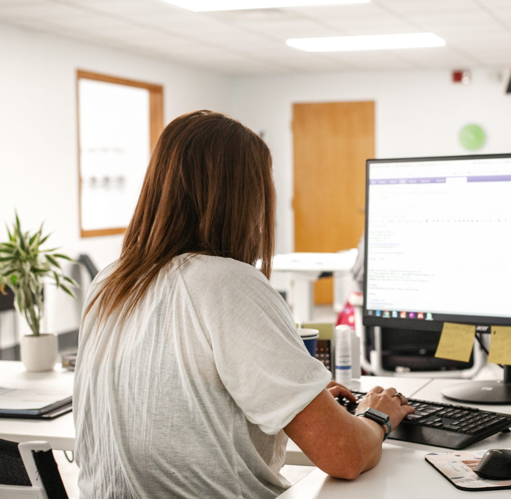 A woman working on a computer