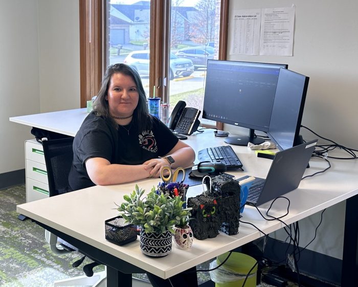 An employee of Illinois Registered Office sits at her desk in our office in Springfield.
